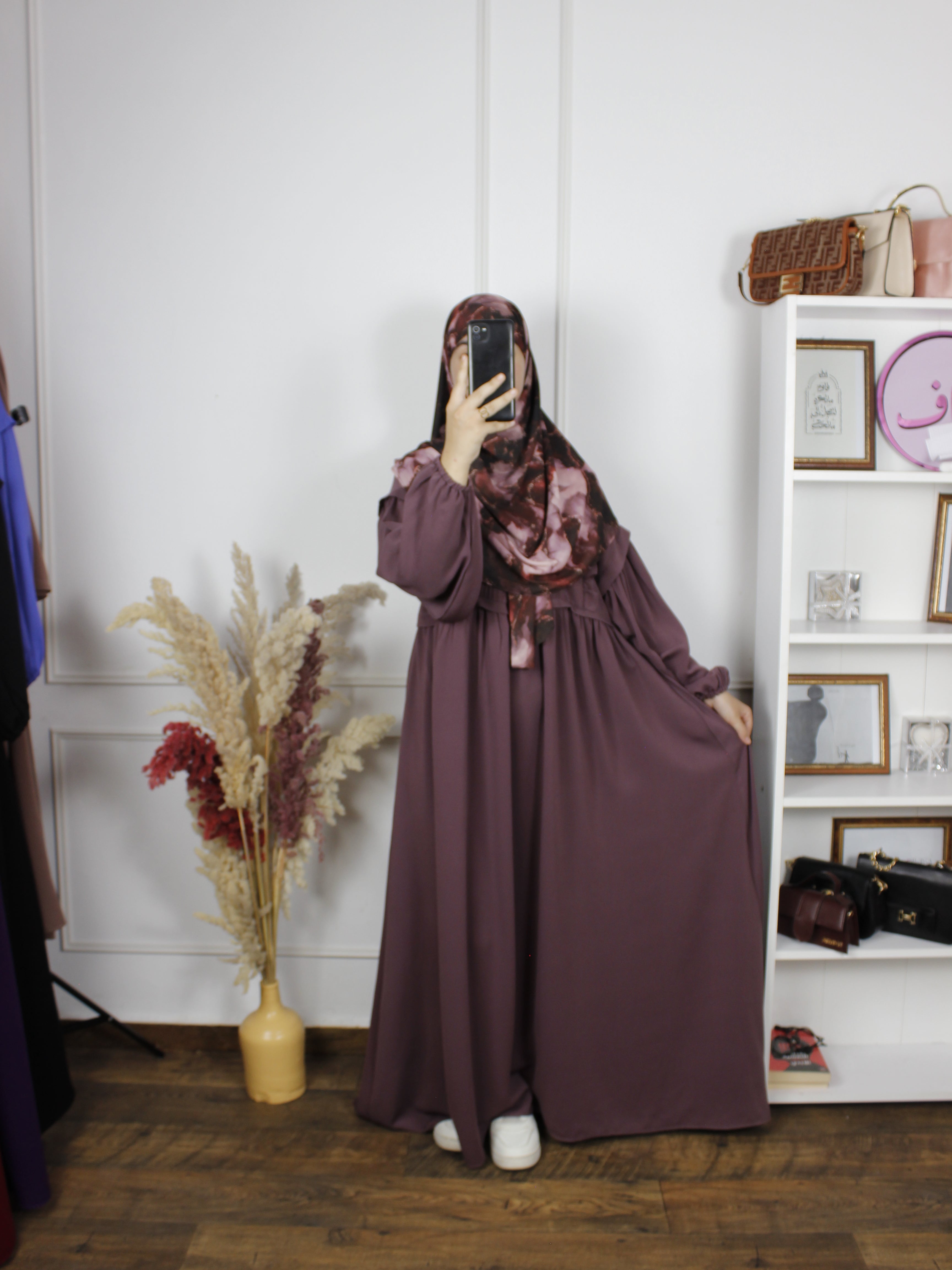 Abaya NV