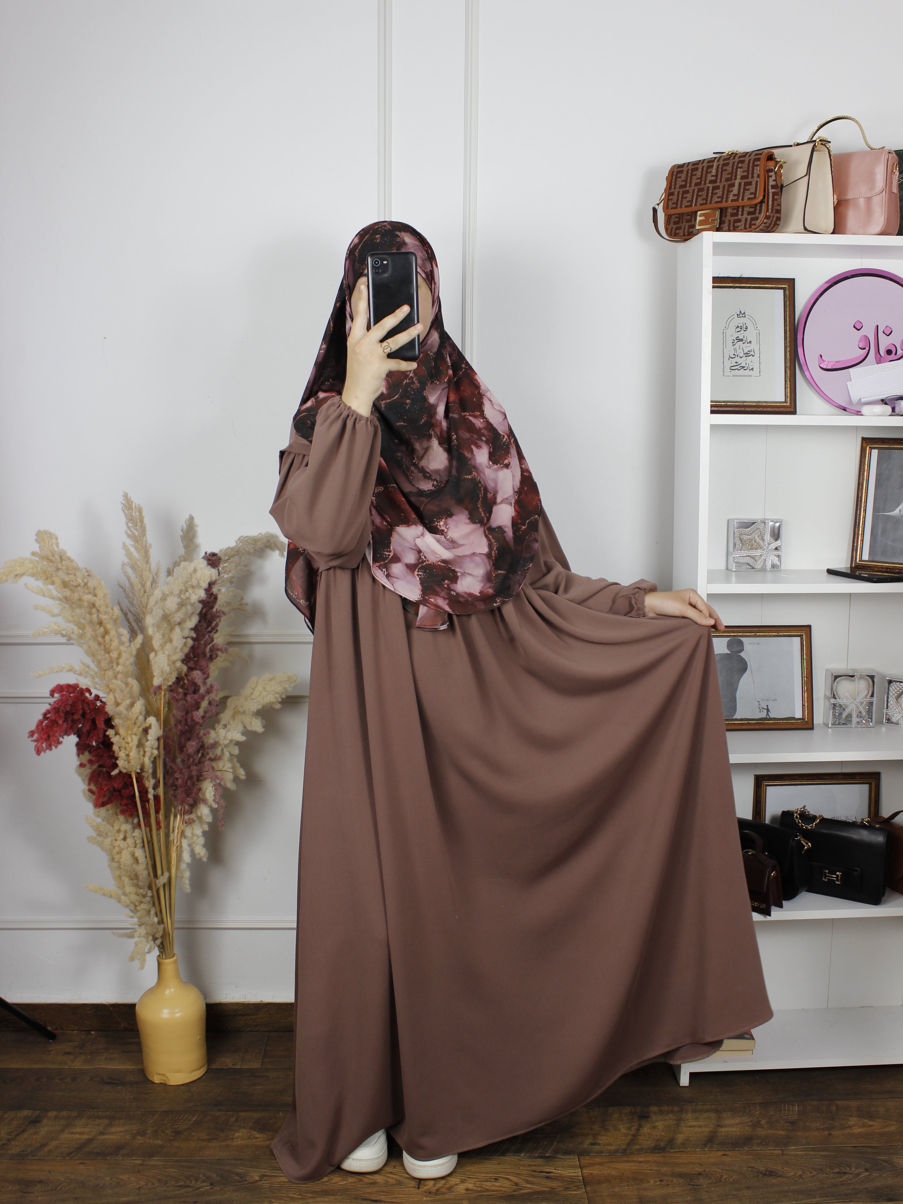 Abaya NV