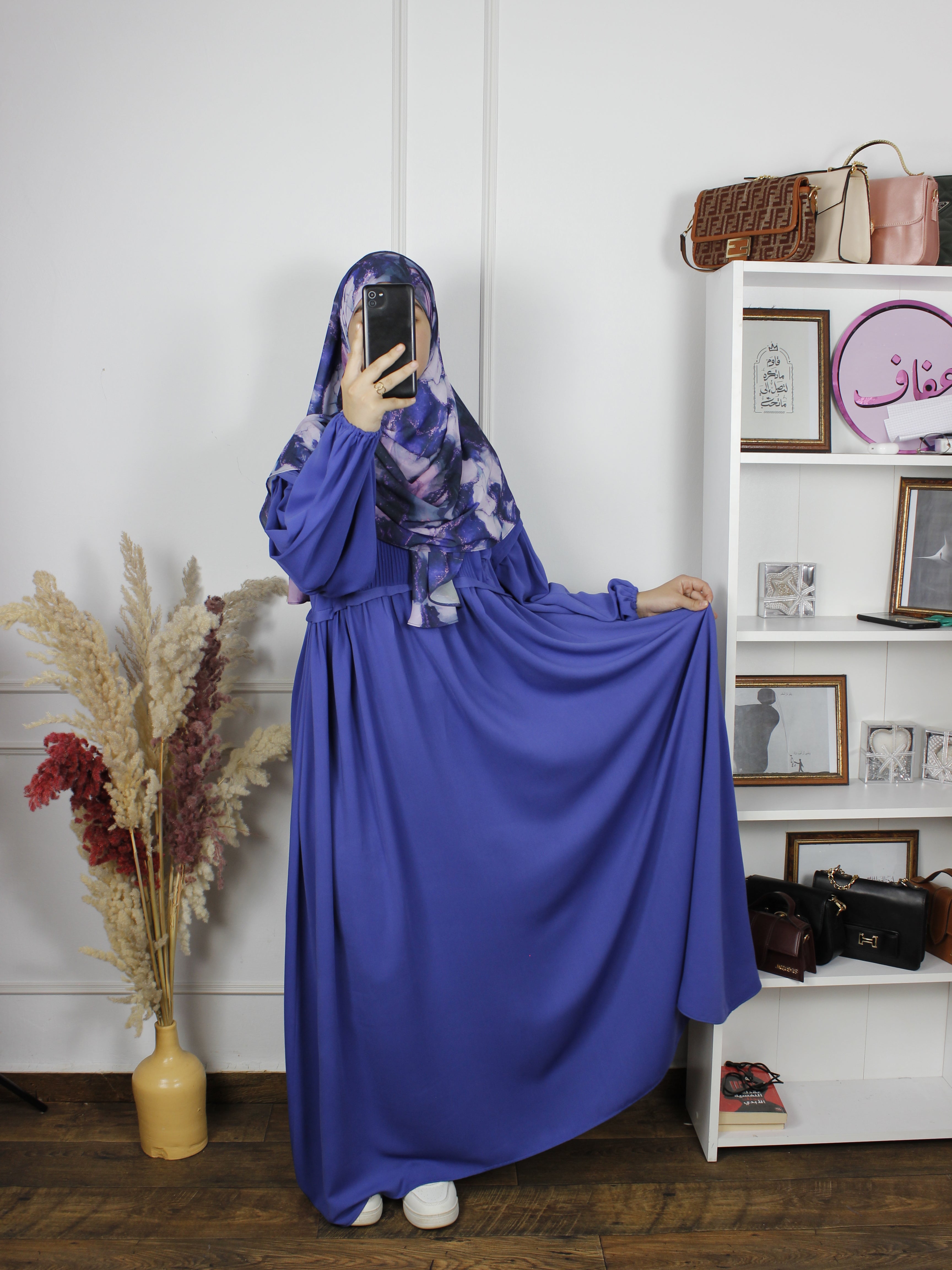 Abaya NV